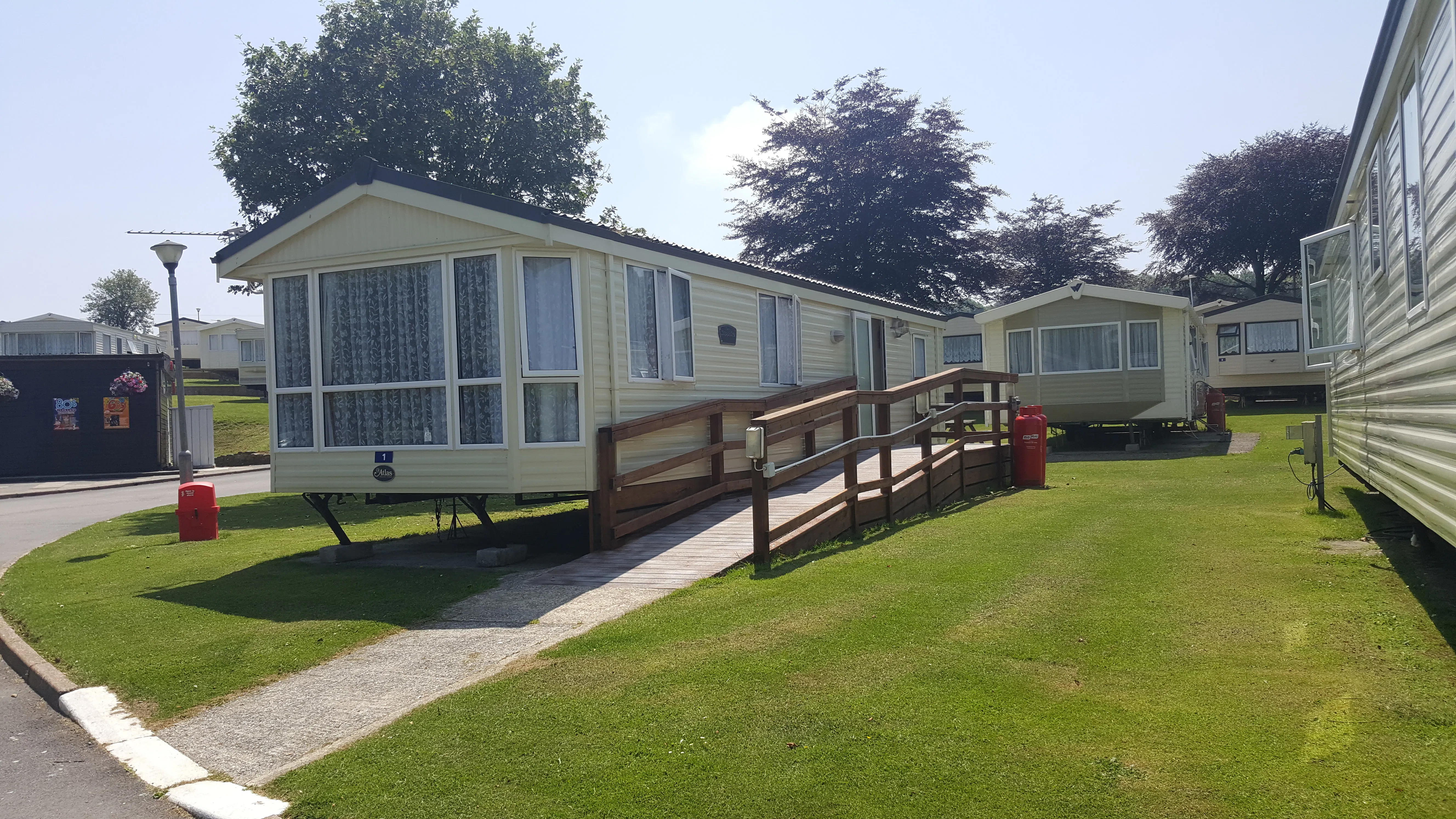 Exterior with Ramp| 2 Bed Bronze Adapted Caravan