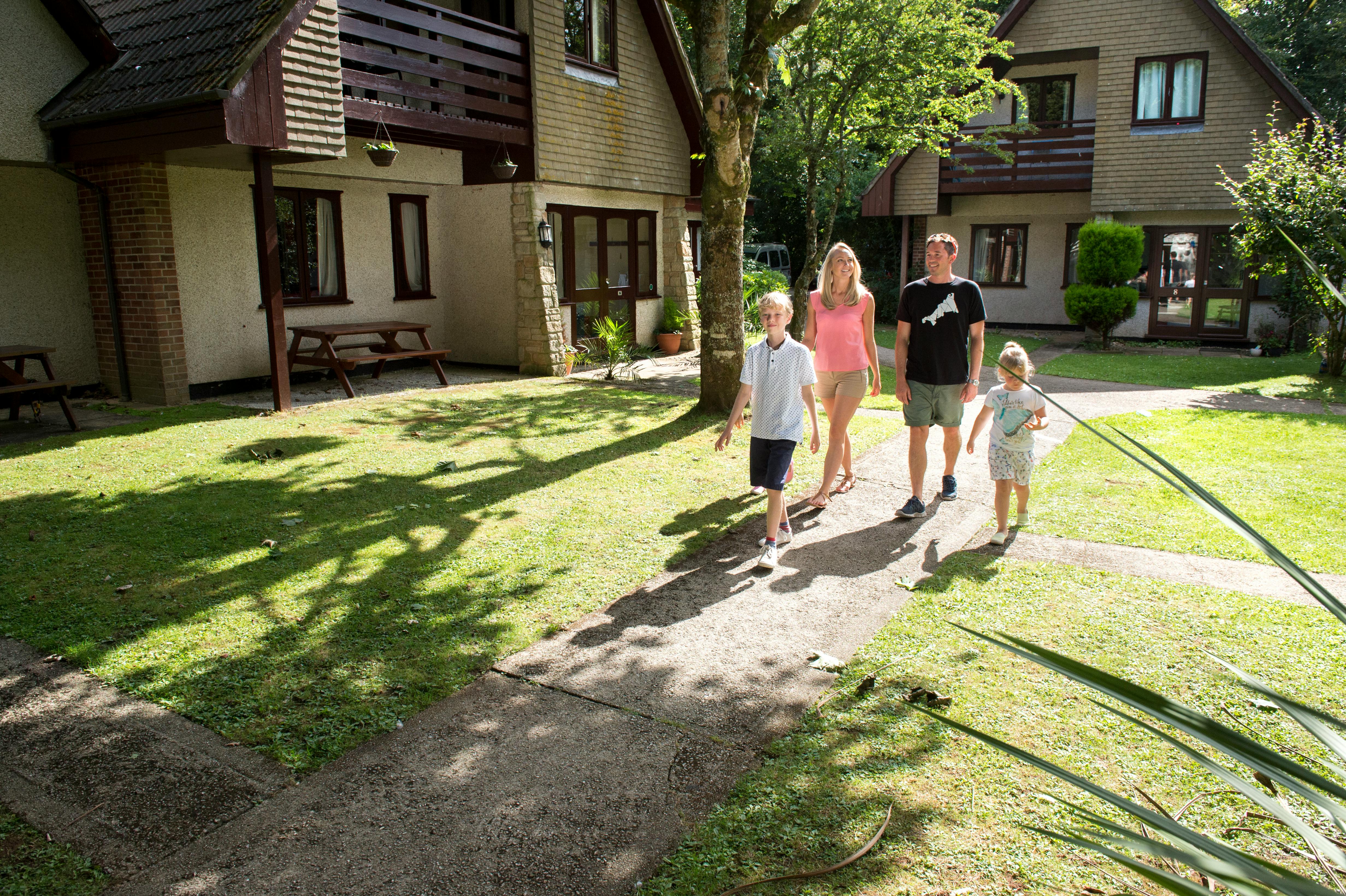 Couple walking through Tudor Court