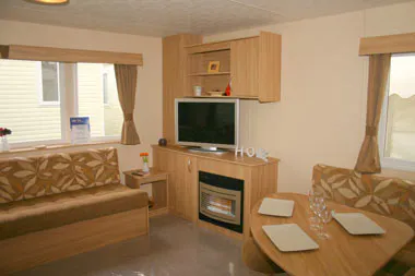 Bronze caravan with outdoor decking area
