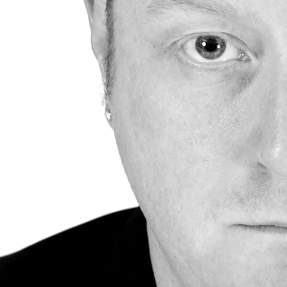 Andrew James as Phil Collins