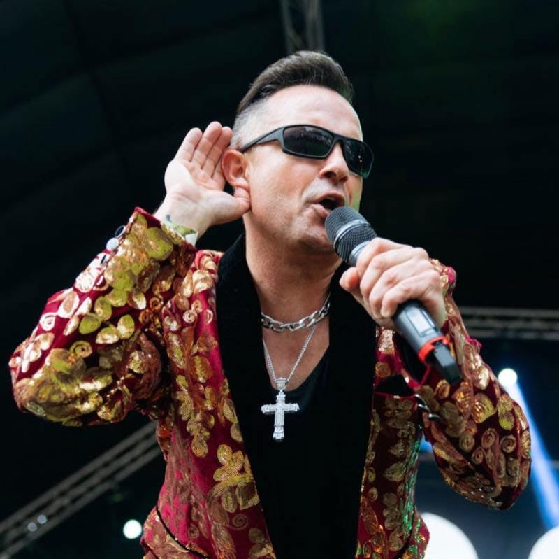 Lee Pashley as Robbie Williams