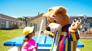 Child with Freddy the Fox on holiday to Somerset